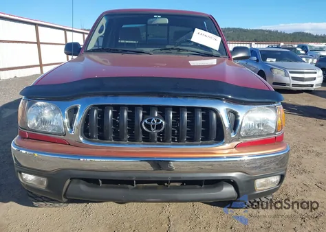 2003 Toyota Tacoma из США, поврежденный, VIN 5TEWM72N53Z177342